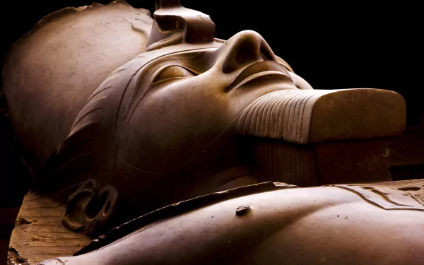 Close-up of a man-made statue's face, captured in stunning detail for a 4K Ultra HD PC desktop wallpaper and background.