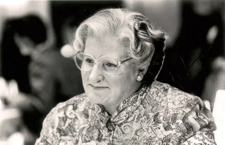 HD desktop wallpaper of a character from Mrs. Doubtfire, in black and white, suitable as a background.
