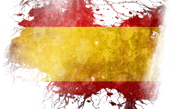 HD PC desktop wallpaper featuring an artistic, grunge-style Spain flag with vibrant red and yellow colors and textured splatter effects.