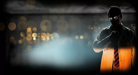 HD PC desktop wallpaper featuring a shadowed figure resembling Gordon Freeman from the video game Half-Life 2, set against a blurred urban night backdrop.