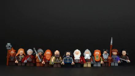A collection of Hobbit-themed LEGO figures arranged against a dark background, showcasing intricate details and vibrant colors in this HD PC desktop wallpaper.