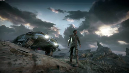 HD PC desktop wallpaper depicting a rugged character standing beside a vehicle in a dramatic, cloudy wasteland scene from the Mad Max video game.