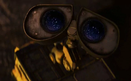HD wallpaper featuring Wall·E, the robot character from the movie Wall·E, gazing at the starry sky.
