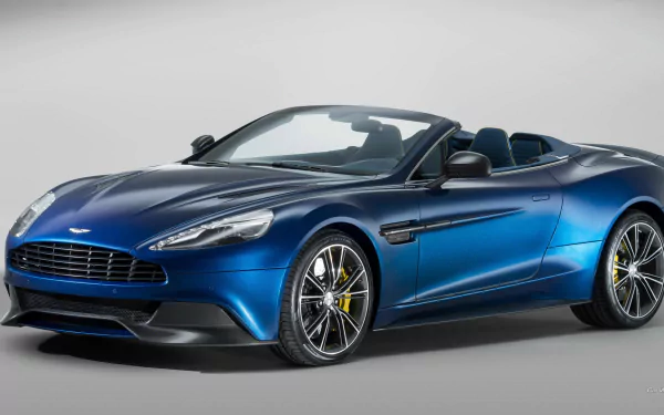 Blue 2014 Aston Martin Vanquish Volante vehicle, convertible, front three-quarter view on neutral backdrop — HD PC desktop wallpaper and background.