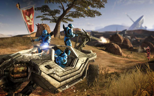 HD PC desktop wallpaper featuring a dynamic battle scene from the video game Halo 3 with armored soldiers and futuristic vehicles in a rugged landscape.