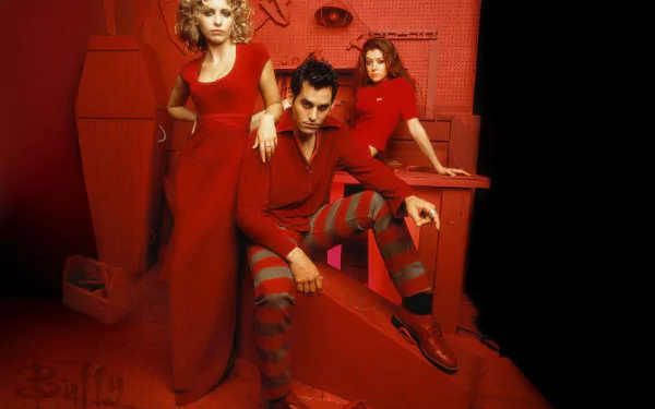 HD PC desktop wallpaper featuring three characters from the TV show Buffy the Vampire Slayer, dressed in red against a vibrant red background.