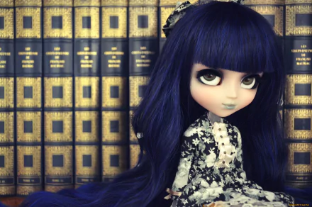 HD desktop wallpaper featuring a man-made doll with long dark hair and a vintage dress, posed in front of a backdrop of old, leather-bound books.