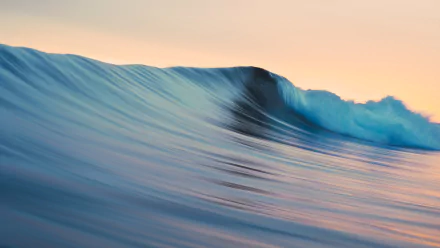 A vibrant wave captured in stunning detail, showcasing the beauty of nature against a serene background, designed as a 4K Ultra HD PC desktop wallpaper.