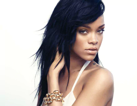 HD desktop wallpaper featuring Rihanna, the Barbadian singer, actress, and fashion designer, with sleek black hair and a confident, captivating expression.