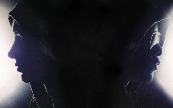 A striking HD wallpaper featuring the silhouettes of two figures with hoods, embodying the essence of Hip Hop and rap, representing the collaboration of Bad Meets Evil.