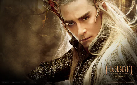 A striking HD wallpaper featuring Thranduil, the elf king from The Hobbit: The Desolation of Smaug, showcasing his majestic appearance against a mystical background.