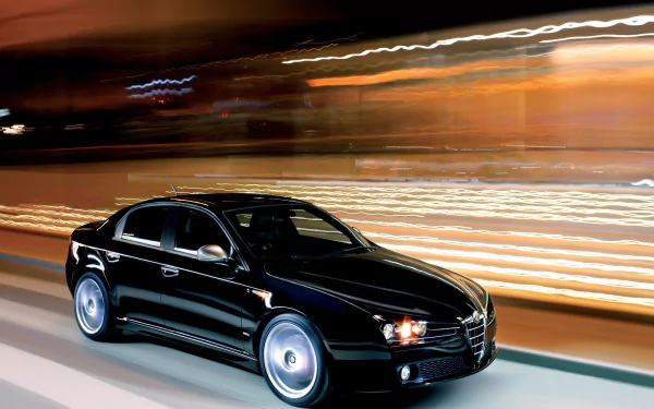 HD PC desktop wallpaper and background: a black Alfa Romeo 159 vehicle speeding through a blurred cityscape, showcasing sleek lines and motion blur.