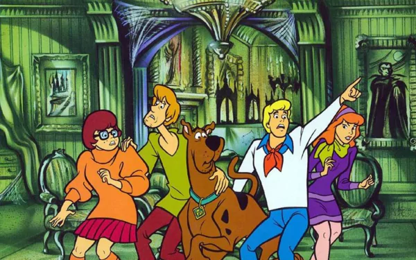 A colorful HD wallpaper featuring the iconic characters from Scooby-Doo, including Scooby, Shaggy, Velma, Fred, and Daphne, poised in a spooky setting ready for adventure.