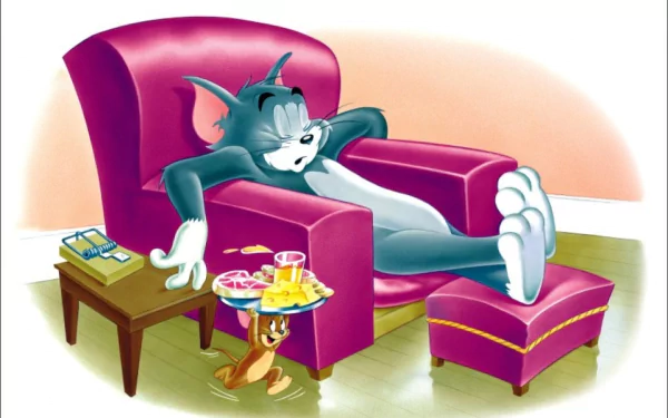 HD desktop wallpaper of Tom and Jerry featuring Tom relaxing in a chair with Jerry serving snacks. The image is tagged with TV Show, Tom And Jerry and is a background image.