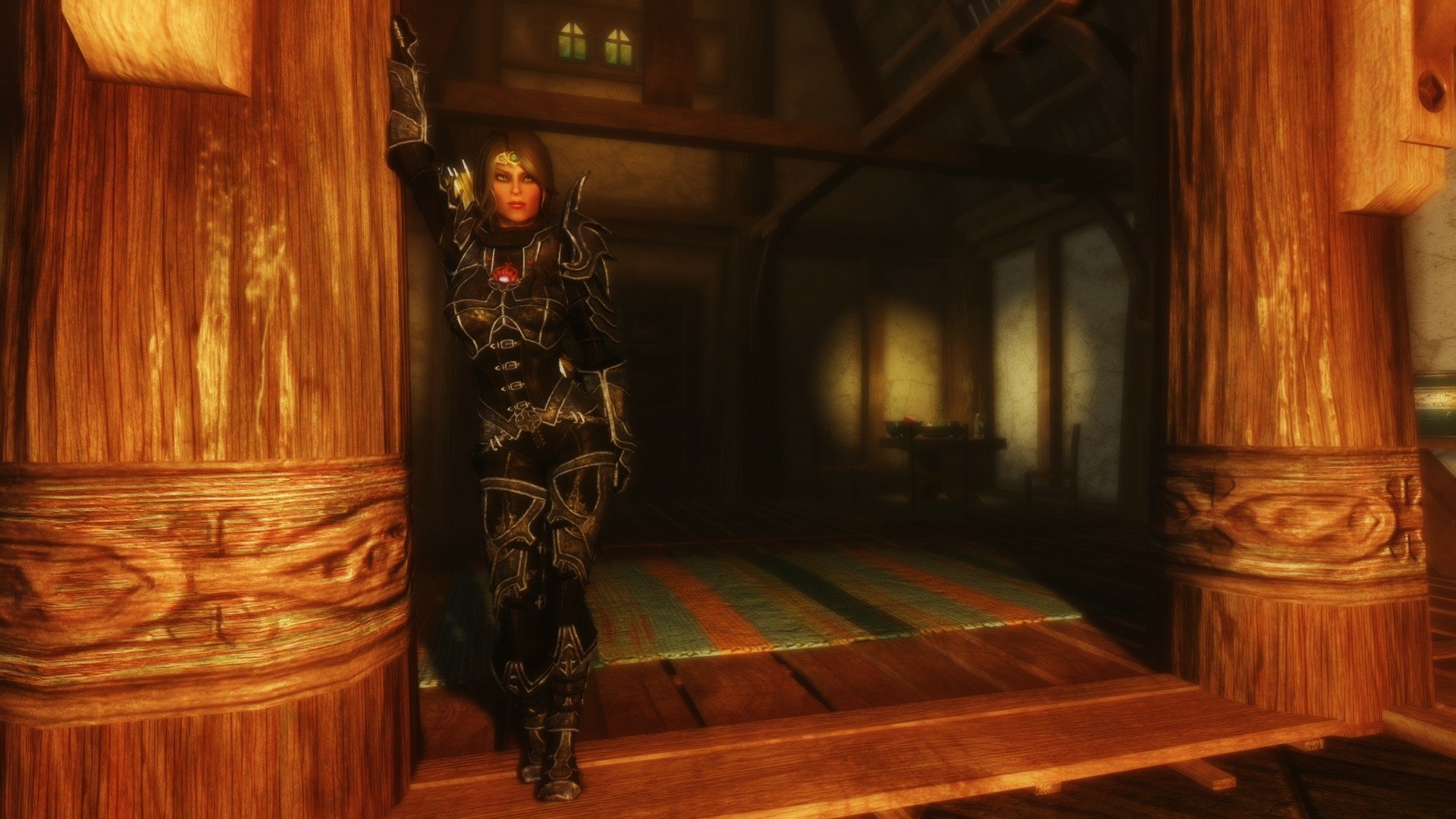 HD desktop wallpaper featuring a dark-armored character from the video game The Elder Scrolls V: Skyrim standing in a warmly lit wooden interior.