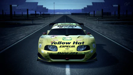 Yellow Toyota Supra race car from Gran Turismo 6 sits centered on a wet racetrack — 4K Ultra HD PC desktop wallpaper and background celebrating the Gran Turismo video game