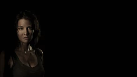 A striking 4K Ultra HD wallpaper featuring a character from The Walking Dead, set against a dark background, capturing a moment of tension and resilience.