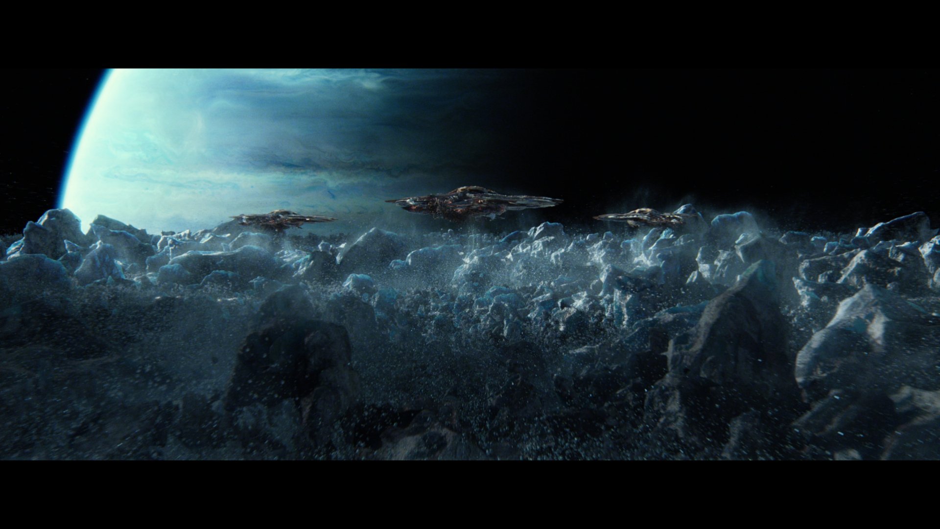 Ender's Game movie 2K Quad HD PC desktop wallpaper: cinematic view of a frozen, cratered alien surface with a planet rising and ships hovering above icy terrain.