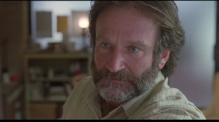 HD wallpaper featuring a close-up of Robin Williams from the movie Good Will Hunting.