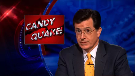 HD desktop wallpaper of Stephen Colbert from The Colbert Report, with a CANDY QUAKE! caption.