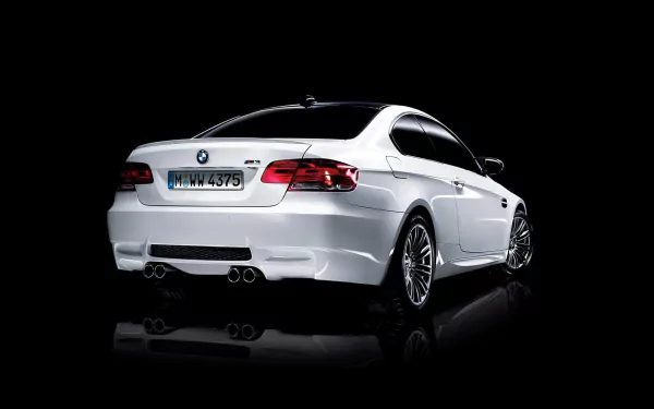 White BMW M3 sports coupe reflected on a glossy black surface — BMW vehicle showcased as an HD PC desktop wallpaper and background.