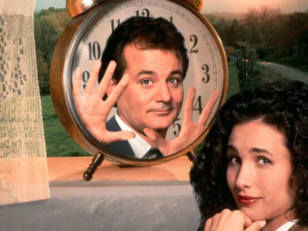 HD wallpaper featuring Bill Murray and Andie MacDowell from Groundhog Day, with Murray behind a clock and MacDowell alongside.