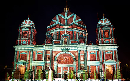 Artistic Festival of Lights — Berlin Cathedral bathed in colorful projection mapping at night; 2K Quad HD PC desktop wallpaper and background.