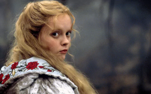 HD desktop wallpaper featuring Christina Ricci in character from the movie Sleepy Hollow, with a dark, moody background.