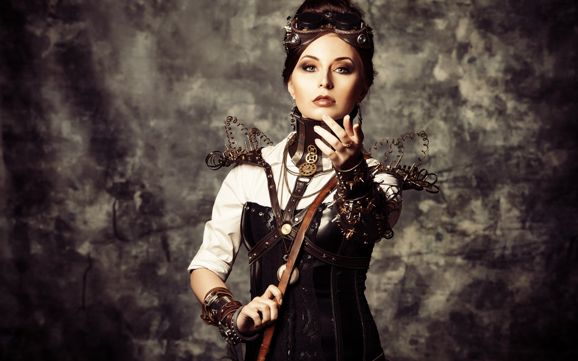 Alt: A person in elaborate steampunk cosplay attire posing for a HD desktop wallpaper with a moody, textured background.