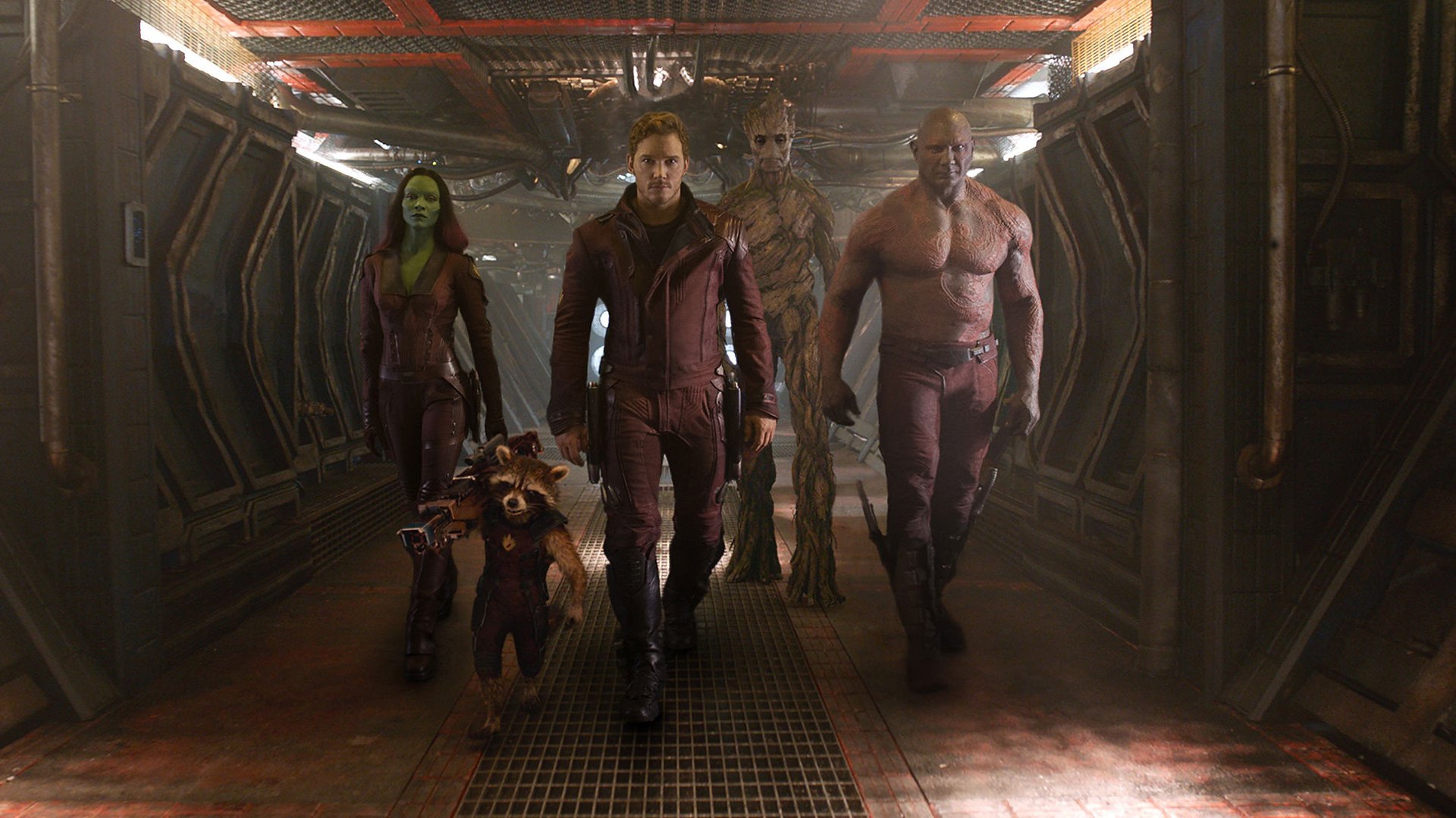 A dynamic scene from *Guardians of the Galaxy* featuring Star-Lord, Drax the Destroyer, Gamora, Groot, and Rocket Raccoon, portraying the iconic team in a sci-fi setting.