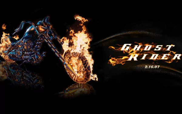 HD wallpaper featuring Ghost Rider, showcasing a fiery motorcycle with intense flames against a dark background, highlighting the movie's title and release date.
