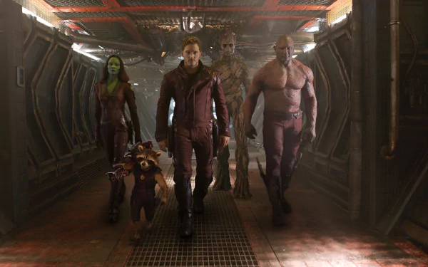 A dynamic scene from *Guardians of the Galaxy* featuring Star-Lord, Drax the Destroyer, Gamora, Groot, and Rocket Raccoon, portraying the iconic team in a sci-fi setting.