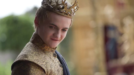4K Ultra HD wallpaper of Jack Gleeson as Joffrey Baratheon from the TV show Game of Thrones, featuring the character in royal attire and a crown.