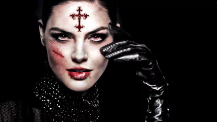 A dark fantasy HD desktop wallpaper featuring a gothic woman with red eyes, facial scars, a red occult cross on her forehead, and a black leather glove against a black background.