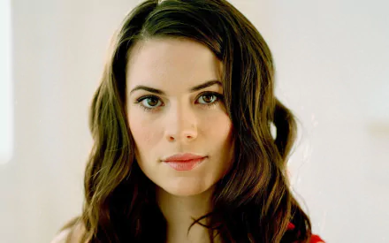 HD desktop wallpaper featuring English actress and celebrity Hayley Atwell with a neutral expression and soft lighting.