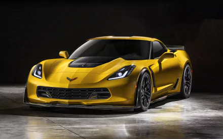 HD PC desktop wallpaper featuring a yellow Chevrolet Corvette Z06 sports car with sleek design and sharp headlights against a dark background.