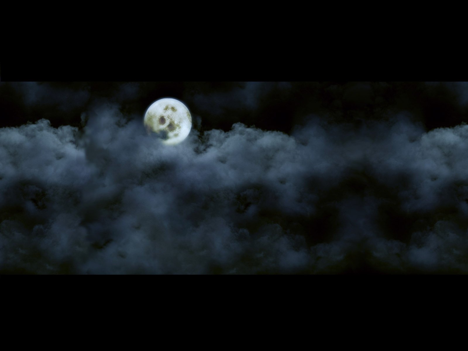 HD desktop wallpaper featuring a bright moon partially covered by dark clouds against a night sky, showcasing the beauty of nature.