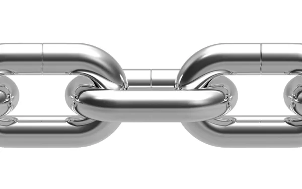 A high-definition image of sleek, shiny metal chains interlinked, showcasing a modern, man-made design that serves as a striking desktop wallpaper or background.