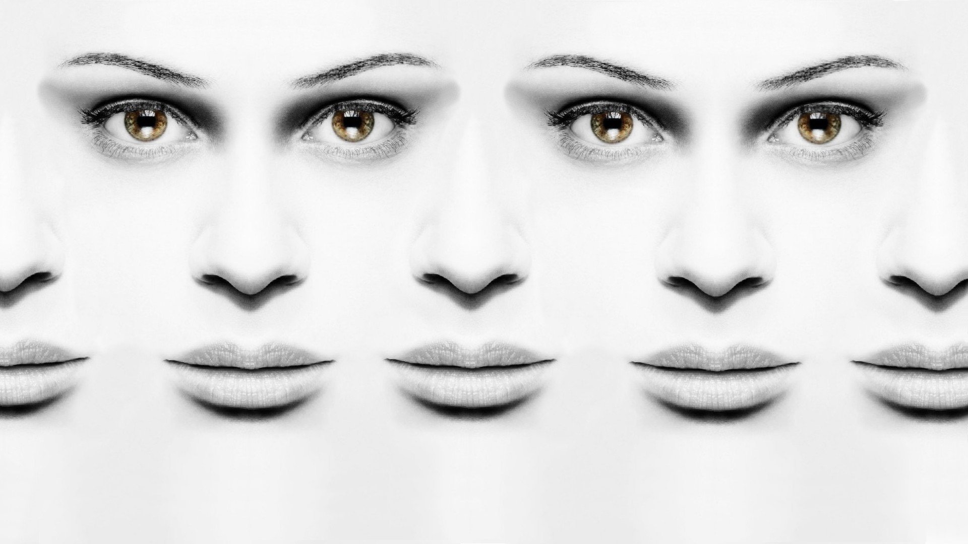 Orphan Black (TV show) HD PC desktop wallpaper: repeating high-contrast close-ups of a woman's face with amber eyes on a minimalist white background.