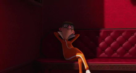 Vector from Despicable Me relaxes on a red tufted sofa in this HD PC desktop wallpaper and background, highlighting the movie's animated style.