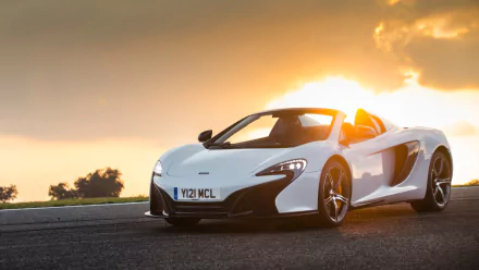 White McLaren 650S Spider supercar parked on a road at sunset, high-definition PC desktop wallpaper and background.