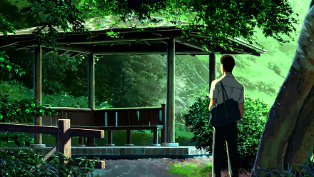 HD wallpaper with a scene from The Garden of Words, featuring a character overlooking a lush garden from a wooden shelter.