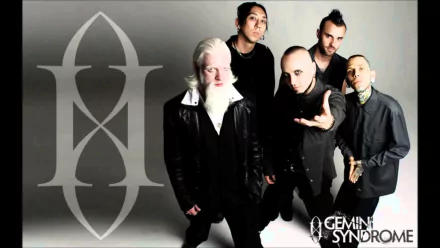 HD desktop wallpaper featuring the band Gemini Syndrome with members posing and their logo in the background.