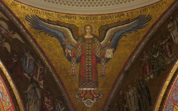 Religious HD PC desktop wallpaper: golden mosaic angel in the Cathedral Basilica of Saint Louis, Byzantine-style tiles and Latin inscription arching across the apse.