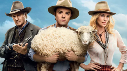 HD desktop wallpaper featuring Charlize Theron and co-stars from the movie A Million Ways to Die in the West, with a comedic Old West theme.