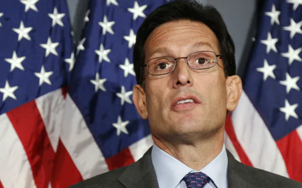 HD desktop wallpaper featuring a man in a suit with glasses against an American flag background.