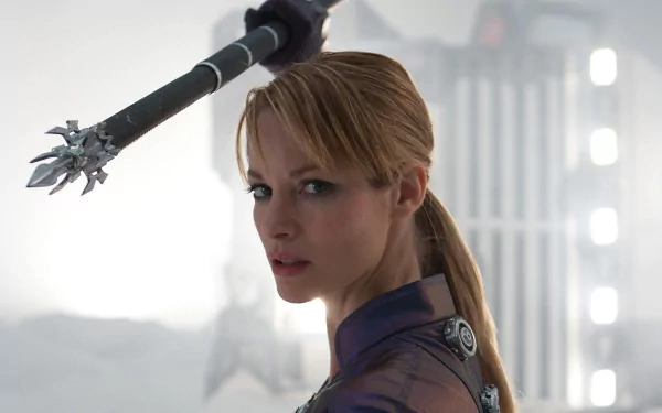 Sienna Guillory as Jill Valentine in Resident Evil: Retribution, featured in a high-definition PC desktop wallpaper and background.