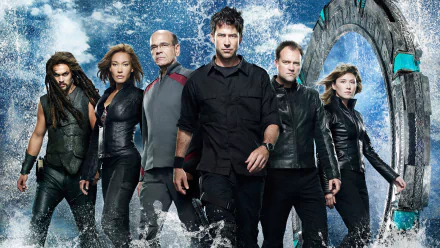 A dynamic HD wallpaper featuring the main cast of the TV show Stargate Atlantis, standing confidently in front of the iconic Stargate against a vibrant, otherworldly backdrop.
