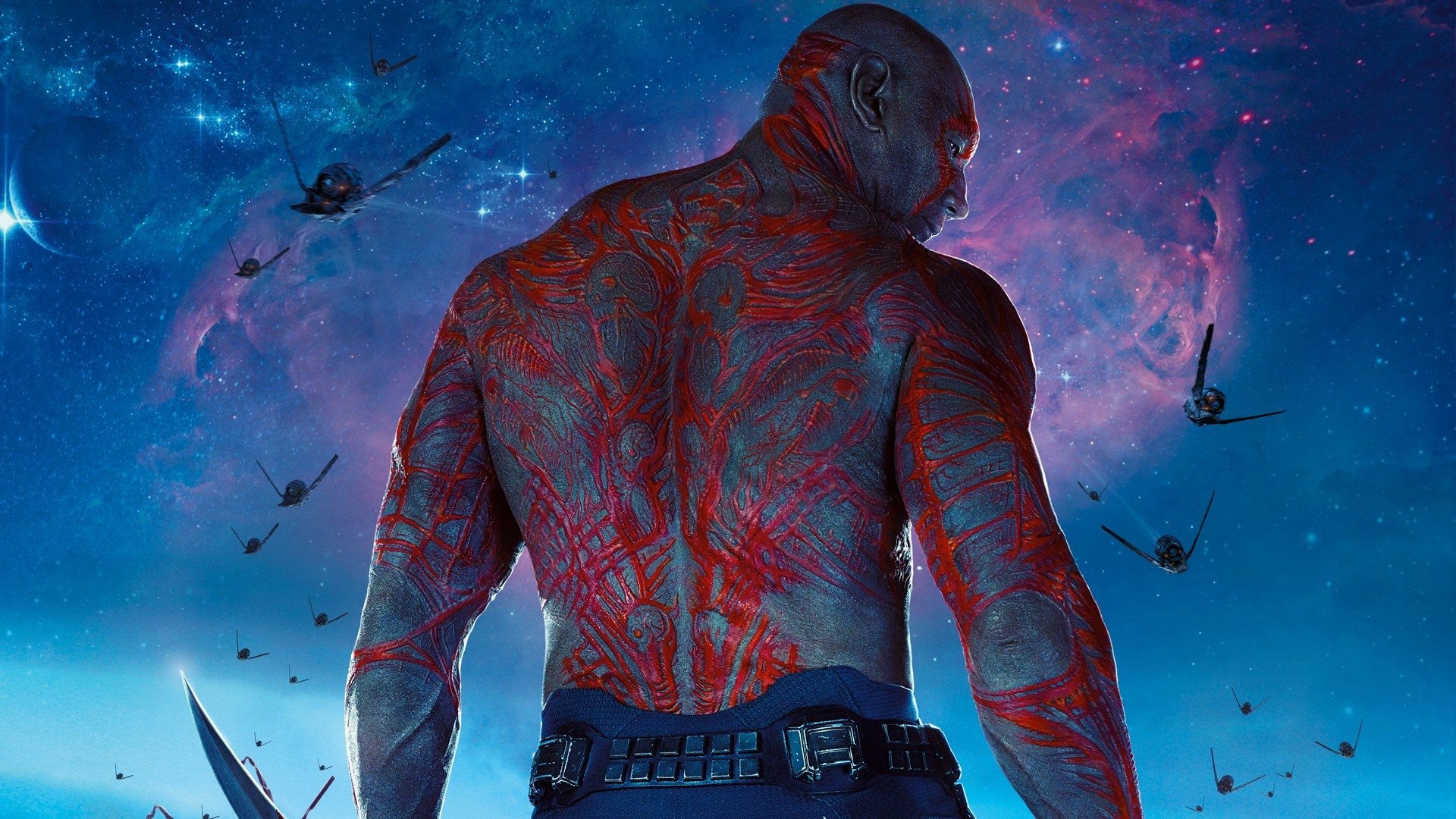 HD PC wallpaper featuring Drax The Destroyer, portrayed by Dave Bautista, from the movie Guardians of the Galaxy, set against a cosmic background.