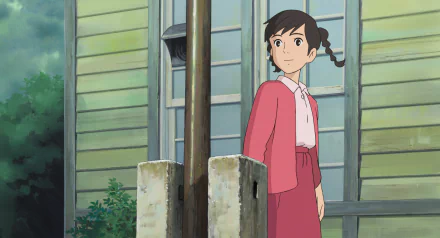 HD wallpaper of a character from From Up On Poppy Hill standing by a gate with a house in the background.